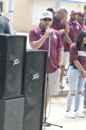 2023 ATHLETIC YEAR GETTING UNDERWAY - Littlefield Athletic Director, Bo Bryant, addresses the crowd at the 2023 Wildcat Street Party on Friday morning, that was held outside of Wellington State Bank on Phelps Ave. in Littlefield. (Staff Photo by Derek Lopez)
