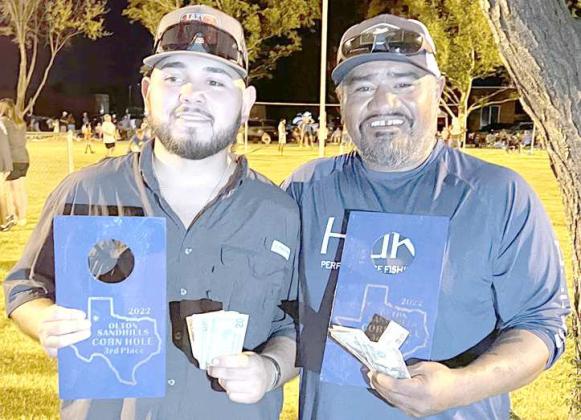 Corn hole - 3rd place winners of the $207 cash prize: Roy Aviles and Albert Sinaloa.