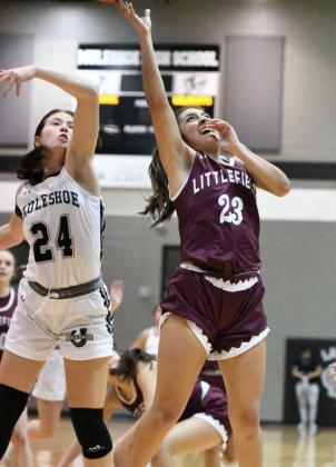 Littlefield senior, Arianna Cruz (23), goes up strong for a lay-up, during the first half of the Lady Cats’, 69-37, road victory over the Muleshoe Lady Mules on Tuesday to close out the regular season. (Staff Photo by Derek Lopez)