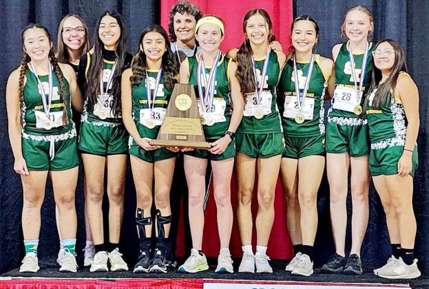 1A REGIONAL CHAMPS - The Springlake-Earth Lady Wolverines’ varsity cross country team placed first overall at the 1A Regional Cross Country Meet, which took palce at Mae Simmons Park in Lubbock on Monday with 97 points. (Shown): Aryca Ibarra, Sydney Furr, Marisela Rodriguez, Aabriella Villanueva, Head Coach Jeri Been Goodman, Taytum Goodman, Emma Samaron, Jenna Bridges, Riley Furr and Jessica Mendoza. (Submitted Photo)