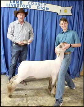 Kooper Edwards of Sudan and his Lamb earned Reserve Grand Champion at the Lamb County Junior Livestock Show that took place in Littlefield on Saturday. He also earned the Lamb Showmanship Award (Photo by Ann Reagan