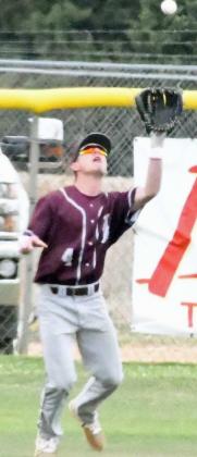 OUT IN THE AIR – Littlefield left fielder, Turner Heffington, catches a fly ball in left-center field for an out durin the early innings of the Wildcats, 14-1, run rule of Denver City on the road on Saturday. (Staff Photo by Derek Lopez)