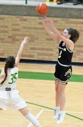 PULLING UP — Sudan sophomore, Stevi Lockhart (2), pulls up and knocks down a jumper in the lane over the Idalou defense for two of her game-high 28 points, during the Nettes, 73-48, loss to Idalou on the road on Saturday. (Staff Photo by Derek Lopez)