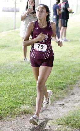 Anaei Ojeda placed 10th overall in the varsity girl’s race at the WT Twilight Meet last Thursday in Canyon. (Staff Photo by Derek Lopez)