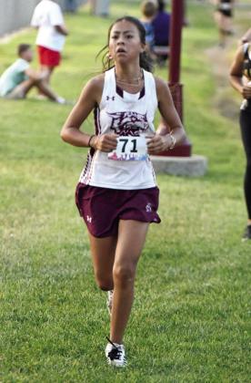 Myah Castillo placed fourth overall in the JV girl’s race at the WT Twilight Meet last Thursday in Canyon. (Staff Photo by Derek Lopez)