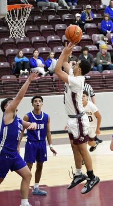 Littlefield’s Ryan Williams goes up for a lay-up, during the first half of their second round match-up with Olton at the Wildcat Classic last Friday. (Staff Photo by Derek Lopez)