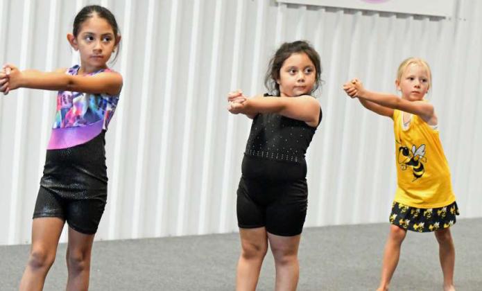 Kids who took part in the Spirit Tumbling, dance and cheer camp this week ended it on Friday with a performance to show off what they have learned. (Staff Photo by Derek Lopez)
