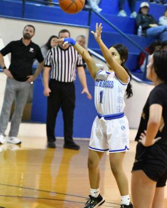 Amherst’s Desi Rodriquez knocks down a free throw to get the Lady Bulldogs on the board in the first quarter, during their home loss to Post on Tuesday. (Staff Photo by Derek Lopez)