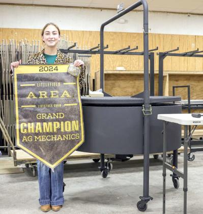 Teagan Miller of Littlefield won Grand Champion Ag Mechanics for her open flame grill that she crafted for the Littlefield Area Junior Livestock Show on Friday at the Lamb County Ag Center. The projects were judged by Dalton Howard. (Photo by MD Creations)