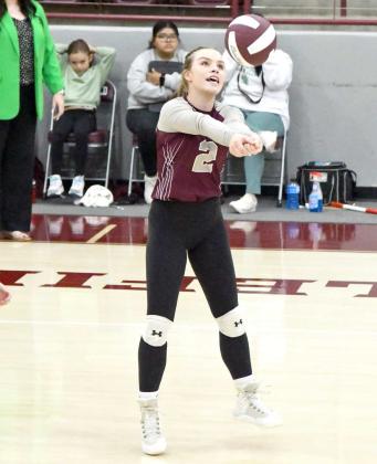 Littlefield senior, Kennadi Hanlin, bumps a ball up in the air, as the Lady Cats look to go on the attack, during the first set of their match with Childress on Saturday, at Wildcat Gym. (Staff Photo by Derek Lopez)