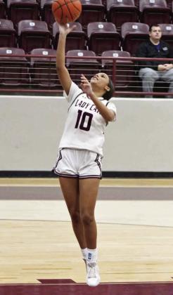 Littlefield freshman, Zalise Davis (10), scores a fastbrak lay-up off of a steal, during the first half of the Lady Cat’s district victory over Dimmitt at Wildcat Gym on Tuesday. (Staff Photo by Derek Lopez)