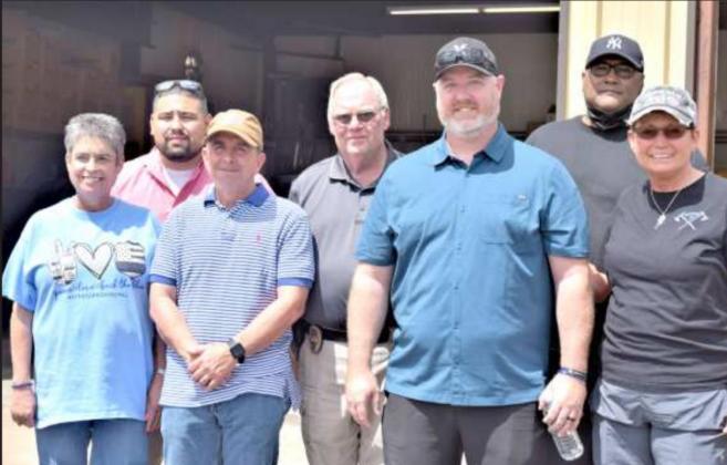 These members of the Levelland Police Dept. attended the benefit for Sgt Shawn Wilson.front row left to right Donna Edwards-Administrative Assistant, Rick Wooten-Officer, Shawn Wilson-Sgt., Tammie McDonald-Captain. Back row, left to right- Rey Nino-Detective, Duane Rust-Captain, and Margarito-Detective. (Photo by Ann Reagan)