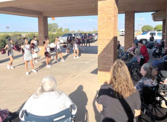 Arbor Grace Wellness Center residents enjoy a Pep Rally by the Littlefield High School cheerleaders during Homecoming Week, Sept. 16th through the 20th. The Wildcat Football team also visited with the residents during the Pep Rally. (Submitted Photo)