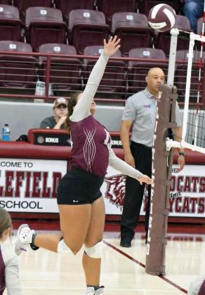 HITTING WITH POWER – Littlefield senior, Kaeleigh Logan, delivers a hit against Childress on Tuesday, during their first set of a, 0-3, loss to the Lady Bobcats at Wildcat Gym in Littlefield. (Staff Photo by Derek Lopez)