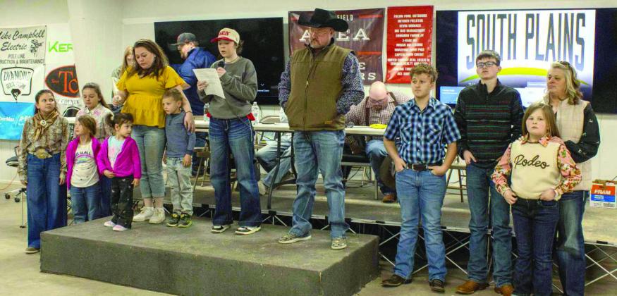 Claire Lostroh presents Quilts of Valor to veterans Tabitha Senter and JJ Bellar at the Littlefield Area Stock Show Auction on January 17, 2026.