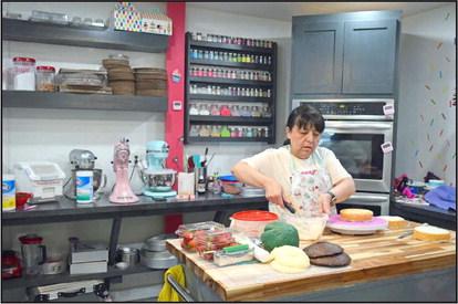 Anita Tucker the owner/baker at Pure Cravings Bakery is following her passion to open her own bakery located just across the railroad tracks on Hwy 385 at Mike’s Jerky Place. (Photo by Ann Reagan)