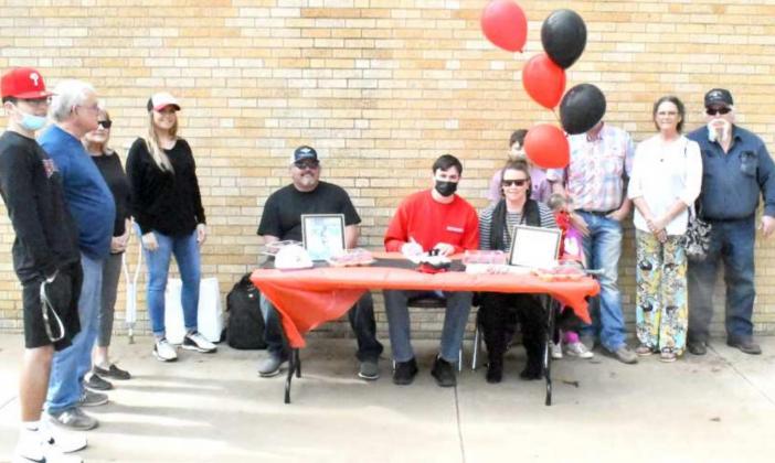 HOWARD BOUND — Last Wednesday was National Signing Day for High School athletes around the country. Littlefield senior, Chris Brown, inked his National Letter of Intent to continue his baseball and academic career at Howard College in Big Spring. Brown was surrounded by family, friends, teammates and coaches as he signed his LOI in the Courtyard at LHS. (Staff Photo by Derek Lopez)