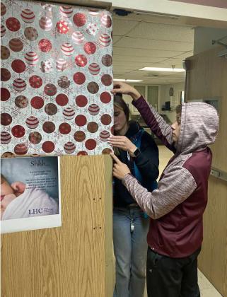 Members of Littlefield 4-H decorated the doors at Lamb Healthcare Center, as part of their Service Project on December 10th.