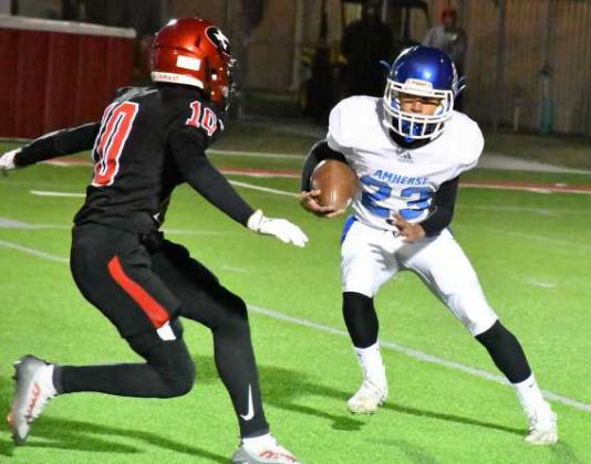 Amherst Freshman Aiden Rodriguez tried to get past Groom Freshman Cooper Treadwell in a 44-24 Bi-District loss for Amherst in Lockney last Friday. Amherst finishes their season at 8-3 overall, 3-1 and district runner-up in UIL Class 1A-2, Region I, District 2. (Photo by Jay Kelley)