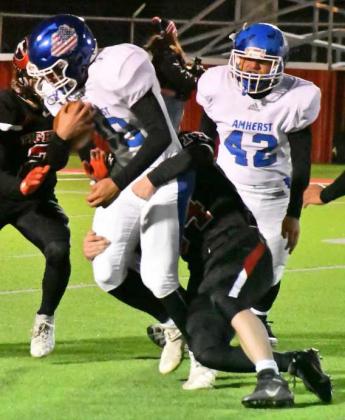 Amherst's Hector Perez bulled his way through Groom defenders in a 44-24 Bi-District loss for Amherst in Lockney last Friday. Amherst finishes their season at 8-3 overall, 3-1 and district runner-up in UIL Class 1A-2, Region I, District 2. (Photo by Jay Kelley)