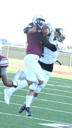 GOING THE OTHER WAY – Littlefield defensive back, Daniel Garcia (7), picks off Lamesa’s Pedro Barrioz, during the first half of the Wildcats’, 42-0, shutout victory over the Golden Tornadoes on Friday for Homecoming. (Staff Photo by Derek Lopez)