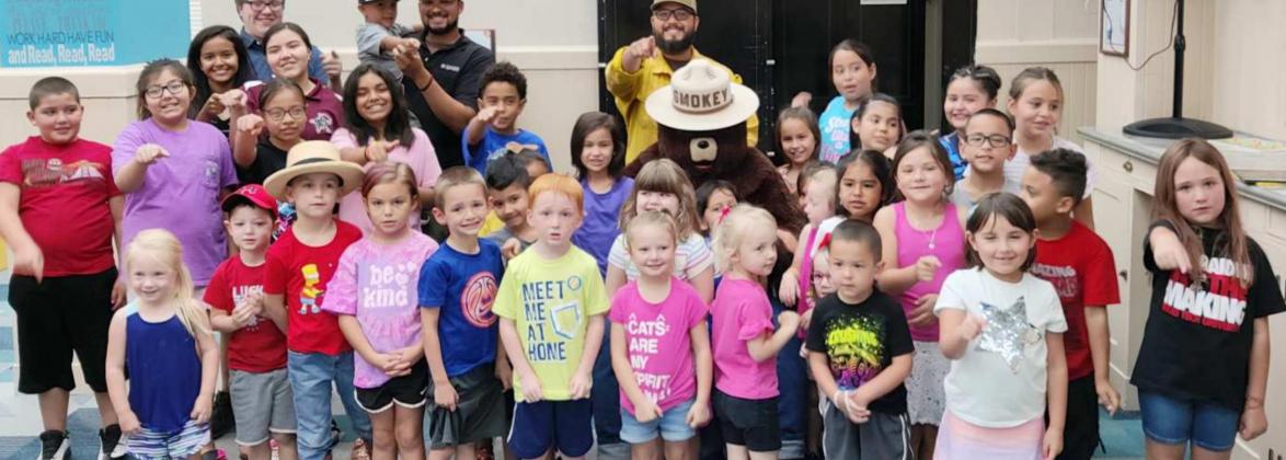 CHILDREN AT LIBRARY’S SUMMER READING