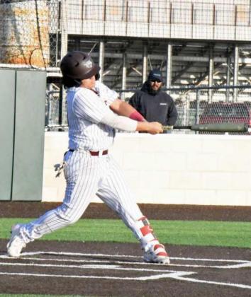SINGLE TO RIGHT — Littlefield senior, Ethan Hackler (10), hit a single to right field, during the bottom of the third inning of the Wildcats, 11-10, walk-off victory over Borger on Friday at the Line Drive Classic. (Staff Photo by Derek Lopez)