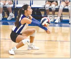 Olton’s Barbara Gallegos digs out a ball, during the second set of the Fillies’ loss to the Littlefield Lady Cats last Tuesday in Olton. (Staff photo by Derek Lopez)
