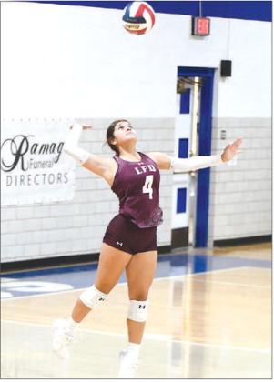 Littlefield’s Abby Rodriguez leaps up to deliver a serve, during the Lady Cats road match-up with the Fillies in Olton last Tuesday. (Staff Photo by Derek Lopez)