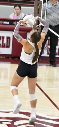 Littlefield’s Bryndle Ray sets a ball up in the air as the Lady Cats look to go on the attack, during the first set of their, 0-3, loss to Idalou on Tuesday in their district-opener at Wildcat Gym. (Staff Photo by Derek Lopez)
