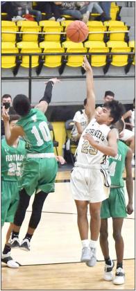 GETTING TO THE LANE - Sudan guard, Sal Juarez (25), gets into the paint and puts up a tear-drop floater over Floydada’sAbran Castillo (10), during the Hornets home loss to the Whirlwinds on Tuesday. (Staff Photo by Derek Lopez)