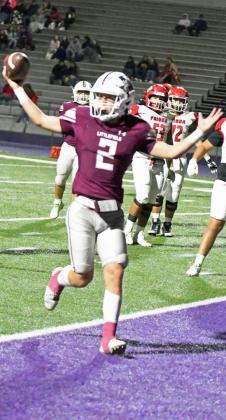 Littlefield safety, Major McNeese, picks off Friona’s Justen Trevino and returns it for the short pick-six, during the first quarter of the Wildcats’ Bi-district win over Friona, in Clovis, N.M. on Friday. (Staff Photo by Derek Lopez)