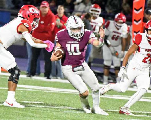 Littlefield senior running back, Ian Mendez, breaks through the middle for a tough run, during the first half of the Wildcat’s Bidistrict victory over Friona in Clovis, N.M. on Friday in the Class 3A Football Play-offs. (Staff Photo by Derek Lopez)