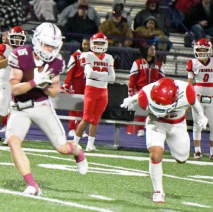 Littlefield senior receiver, Bradyn Redman (15), catches a pass from back-up quarterback Nate Castaneda, as he turns it up field for a touchdown, during the fourth quarter of the Wildcat’s Bi-district victory over Friona in Clovis, N.M. on Friday in the Class 3A Football Play-offs. (Staff Photo by Derek Lopez)