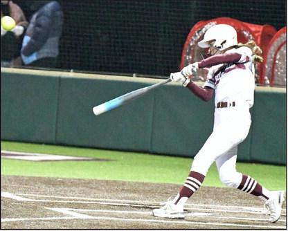 Littlefield’s lead off hitter, Bryndle Ray, leads off the bottom of the first inning with a triple over Brownfield’s center fielder, and ended up scoring on a throwing error to tie the game, 1-1, during the Lady Cats, 1312, victory in their season-opener on Tuesday. (Staff Photo by Derek Lopez)