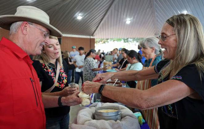 Serving Homeade Ice Cream on Wednesday at the Ice Cream Social, during the opening day of the 44th annual Sandhills Celebration. (Photo by Wesley Quigley)