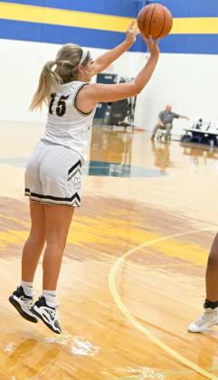FIRING THE THREE-BALL - Sudan senior, Landree Gonzales (15), drains a three from the right wing, during the first half of the Nettes’, 70-51, loss to the Coronado Lady Mustangs on Thursday morning in their first game of pool play at the Hub City Tip Off Classic at Frenship High School. (Staff Photo by Derek Lopez)