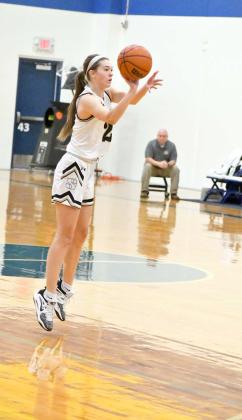 HAND DOWN, MAN DOWN - Sudan senior, Stevi Lockhart (2), fires up a deep three from the right elbow and drains it, during the first half of the Nettes’, 70-51, loss to the Coronado Lady Mustangs on Thursday morning in their first game of pool play at the Hub City Tip Off Classic at Frenship High School. (Staff Photo by Derek Lopez)
