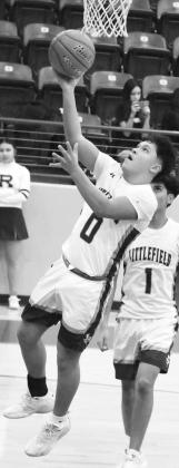 Littlefield’s Blayton Soliz (0) drops in a lay-up, during the first half of the Wildcats’ home vicotry over the Eagles on Wednesday at Wildcat Gym. (Staff Photo by Derek Lopez)
