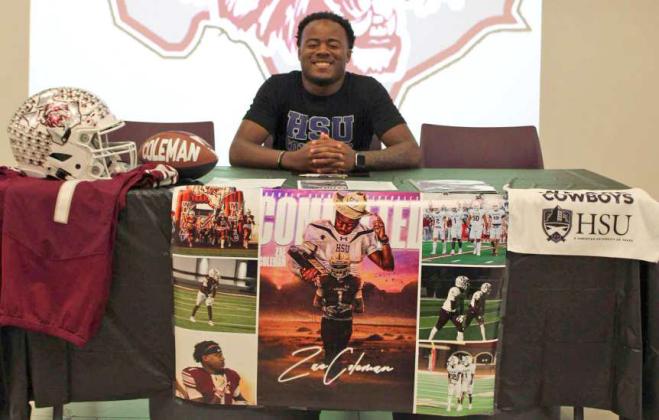 Littlefield’s Eizeah Coleman signes his letter of intent to continue his football and acedmic career at Hardin Simmons playing football for the Cowboys. Coleman signed during a ceremony on April 25th in the Commons Area of Littlefield High School, surrounded by family, friends, teammates and coaches. (Submitted Photo)