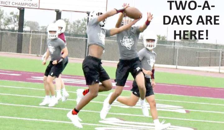 GOING THE OTHER WAY – Littlefield varsity defensive back, MJ Randle, gets an interception on Monday during defensive drills at the first day of two-a-days for the Wildcats. (Staff Photo by Derek Lopez)