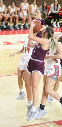 Littlefield junior, Marysa Saenz, pulls up for a short jumper from the left side, during the first half of the Lady Cats’, 47-41, victory over the Denver City Fillies to open district play on Tuesday. (Staff Photo by Derek Lopez)