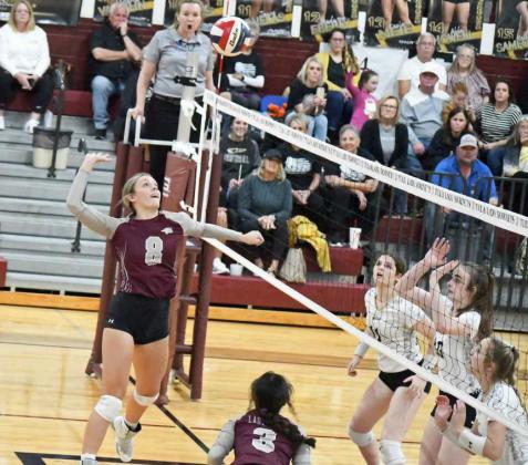 LOOKING FOR A KILL - Littlefield senior, Madison McNeese, leaps up for a kill at the net, during set two, of the Lady Cats’ Bi-district play-off game against Bushland on Tuesday at Tulia. The Lady Cats fell to the Lady Falcons in straight sets, 0-3. (Staff Photo by Derek Lopez)