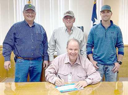 In preparation for the Soil and Water Stewardship Week, April 30th – May 7th, Judge Deloach signed the proclamation, on Monday April 3, 2023. Lamb County Soil and Water Conservation District board members in attendance were standing are from left to right: Larry Hobratschk, Roy Thompson and Tracy DeBerry. (Submitted Photo)
