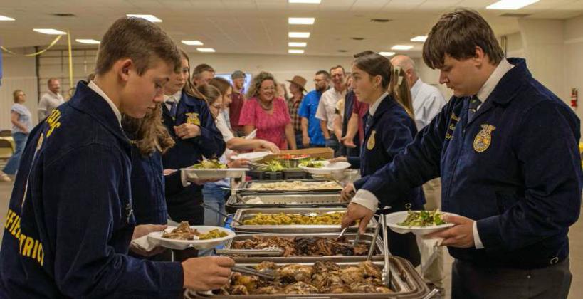 Attendees and FFA officers gather to feast at the annual FFA banquet on May 12, 2025. (Staff Photo by Madison Vidales)