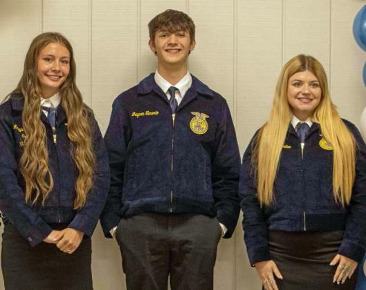 Maggie McNeese, Ky Hays and Ally Dalton pose to receive recognition for participating in the leadership development event teams at the annual FFA banquet on May 12, 2025. (Staff Photo by Madison Vidales)