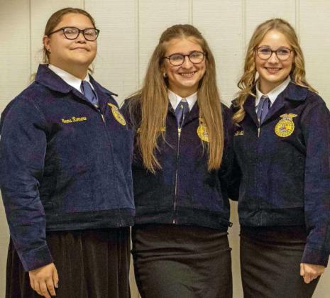 Emma Romero, Avaley Campbell and Kat Hill pose to receive recognition for participating in GH Skills 1 at the annual FFA banquet on May 12, 2025. (Staff Photo by Madison Vidales)