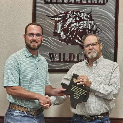 Superintendent Mitch McNeese presented Gary Birkelbach with a plaque commemorating his served on the LISD School Board from 2013-2025, during the Oct. 20th School Board Meeting. (Staff Photo by Derek Lopez)