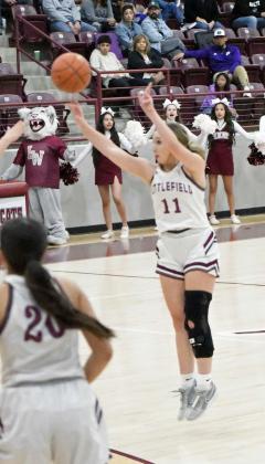 Littlefield senior, Marysa Saenz, fires up a three from the top of the key on senior night, as the Lady Cats take down Dimmitt, 52-31, to close out the regular season. (Staff Photo by Derek Lopez)