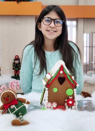MacDONALD won second place in the 8-11 age category of Lamb County Library’s Gingerbread House Contest. Taking first Riley Patterson, and third place was Joshua Bownds. (Submitted Photo)